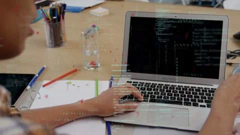 Male developer coding on laptop, tapping trackpad and pointing with pen, Stock Footage 335282048