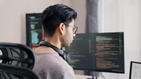 Male Developer Engrossed in Code. Stock Footage 267179428