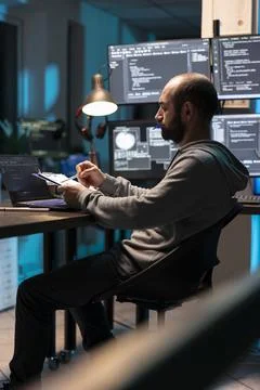 Male Developer Focused on Coding and Network Security Foto stock