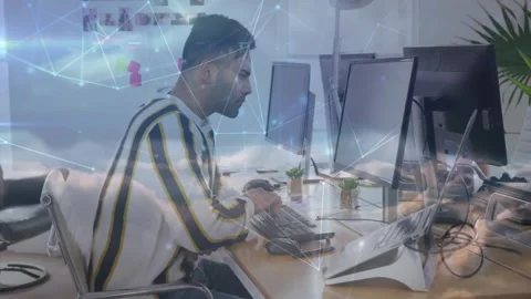 Male developer typing and clicking keys, activating animated network overlay Stock Footage 334312286