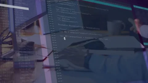 Male developer typing, clicking mouse by mug, bringing up code overlay covering Stockbeeldmateriaal 335466173