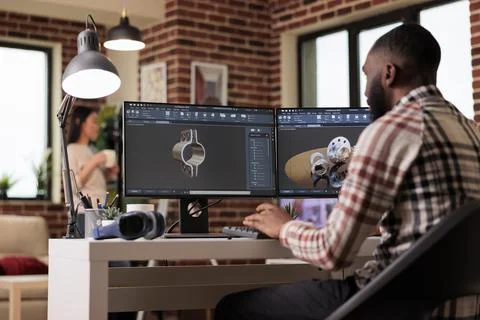 Male developer working with manufacturing software Stock Photos