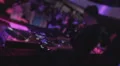 Male DJ in headphones playing music on professional sound deck HD Footage