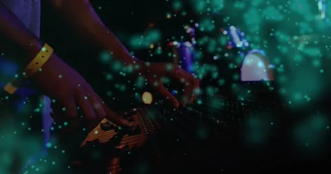 Male DJ twisting knobs, sliding faders for live set, resting, teal overlay 스톡 동영상 330563824