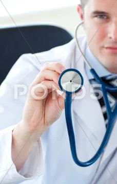 Male doctor holding a stethoscope Stock Photos