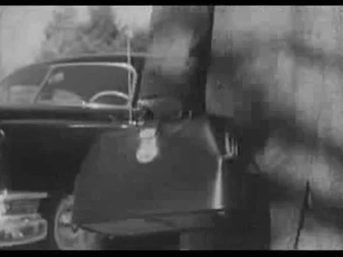 A male doctor smokes in his office and in a car, on a house call, and a female Stock Footage