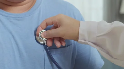 Male Doctor'S Hand Using Stethoscope With A Patient For Medical Check Up Video stock 249608559