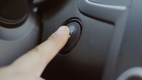 The male driver presses the button to start a new car. Start without a key. New 스톡 동영상 89001173