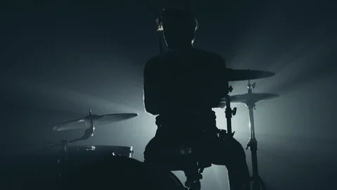 Male Drummer Silhouette Playing the Drums. Shot in the style of a shaking Stock Footage