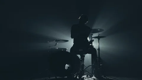 Male Drummer Silhouette Playing the Drums. Empty stage and concert Stock Footage