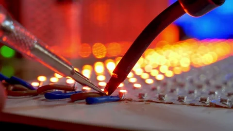 Male Electronics Technician Soldering Internal Wires of Hardware Device Stock Footage 336946087