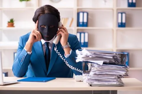 Male employee in the office in industrial espionage concept Stock Photos