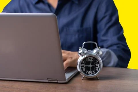 Male employee reading data from computer while working from home or WFH To pr Stock Photos