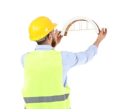 Male engineer with bridge model on white background, back view Stock Photos