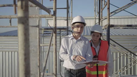Male engineer construction inspecting the construction site. Stock Footage 176905134