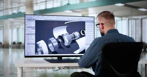Male Engineer Developing Mechanical Parts Using 3D CAD Software On Laptop 写真素材