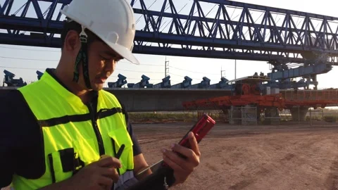 Male engineer inspecting construction work on site Stock Footage 231609829