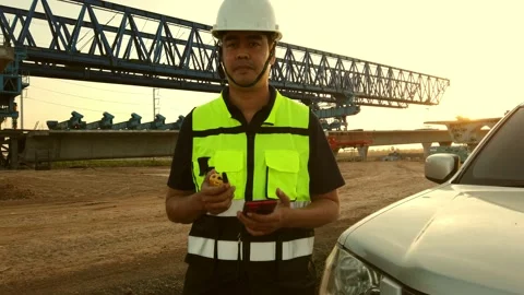 Male engineer inspecting construction work on site Stock Footage 231610682