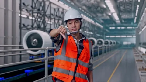 Male Engineer Showing Thumbs Down And Shaking His Head, Aircraft Engine Factory Vídeos de archivo 314589995