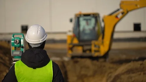 Male engineer, surveyor, builder, foreman, worker in uniform and hard hat Stock Footage 98322862