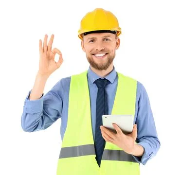 Male engineer with tablet computer showing OK on white background Stock Photos