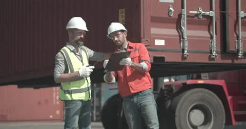 Male engineer talking with Foreman for prepare loading container box. Stock Footage 200987209
