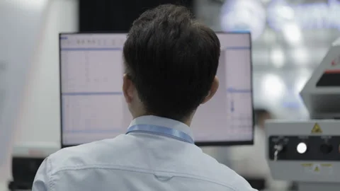 Male Engineer Working on Computer Software in High Tech Laboratory Office Stock Footage 315790446