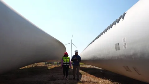 Male engineers are talking about wind turbine system technician woman 스톡 동영상 121199917