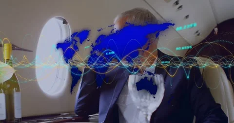 Male executive leaning on hand inside jet cabin, displaying world map and Stock Footage 329569181