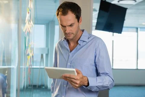 Male executive using digital tablet 스톡 사진
