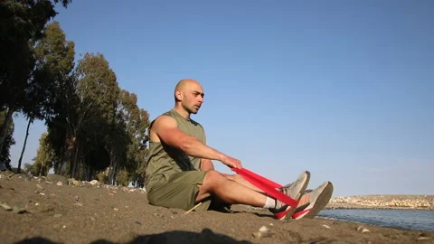 Male exerciser doing biceps exercises Stock Footage 238731141