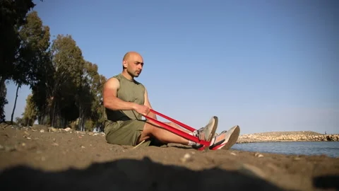 Male exerciser doing biceps exercises Stock Footage 238731589