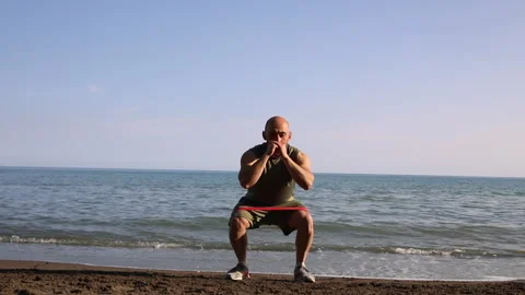 Male exerciser doing biceps exercises Stock Footage 238733617