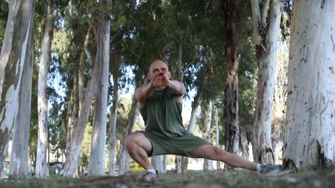 Male exerciser doing biceps exercises Stock Footage 239448927