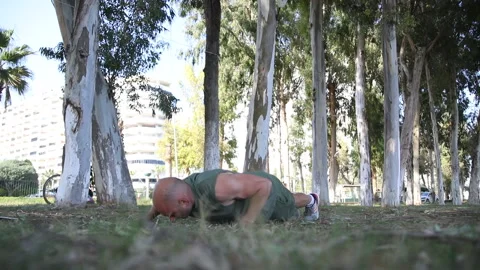 Male exerciser doing biceps exercises Stock Footage 239448948