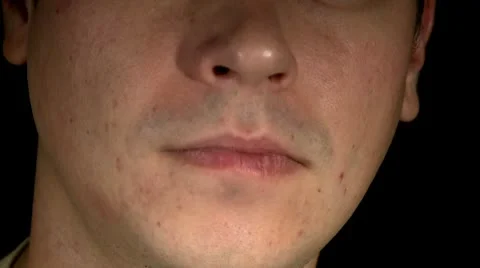 Male face, touching lips Stock Footage 10704533