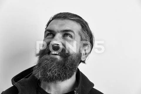 Male fashion, beauty and advertisement concept. bearded happy brutal caucasian Stock Photos