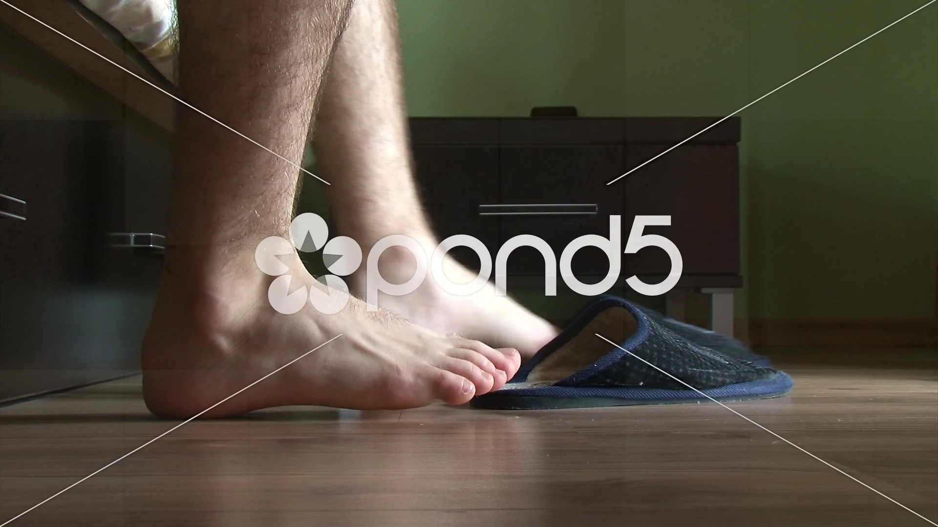 Male feet getting out of bed, put on sli... | Stock Video | Pond5