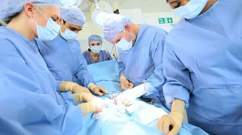 Male Female Doctors in Operating Room Stock Footage