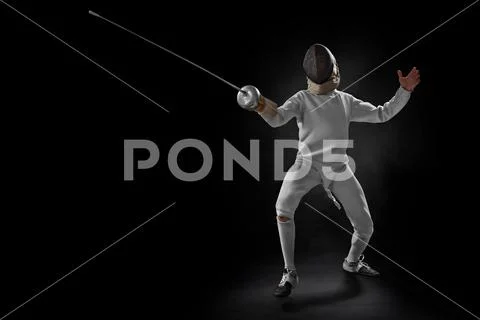 Male fencer in action Stock Photos