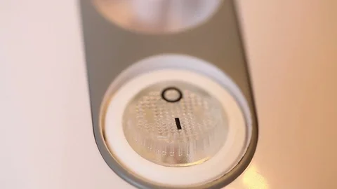 Male finger presses the button on the device. Stock Footage 72561082