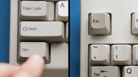 Male finger pushes CTRL + SHIFT + ESC on keyboard. Slow motion and macro view Stock Footage 122197061