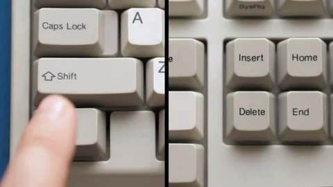 Male finger pushes SHIFT + DELETE button on keyboard. Slow motion and macro view Stock Footage 122197829