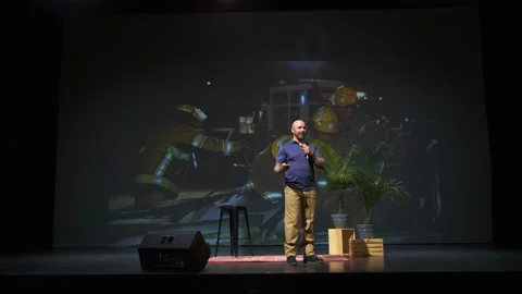 Male fireman speaking on stage Stock Footage 220366482