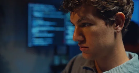 Male freelance developer typing write prompt AI bot coding at office night. Vídeo Stock 347148720