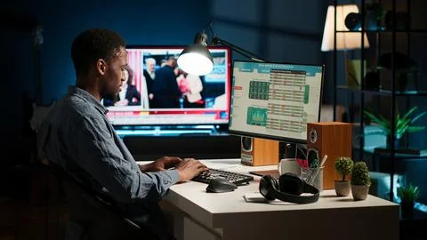 Male freelancer evaluating monetary data and searching funding sources Stock Photos