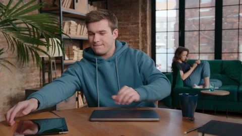 Male freelancer using tablet during break Stock Footage 160034370