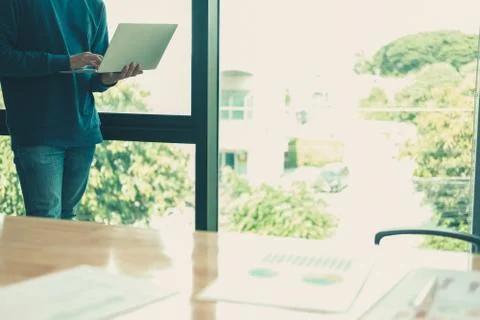 Male freelancer working with computer. startup man analyzing data. student st Stock Photos