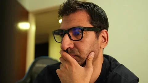 A male freelancer working on a powerful desktop computer Stock Footage 339283620