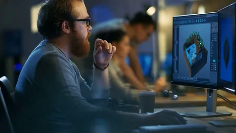 Male Game Developer works on a Level Design on His Personal Computer. Stock Footage 79397349